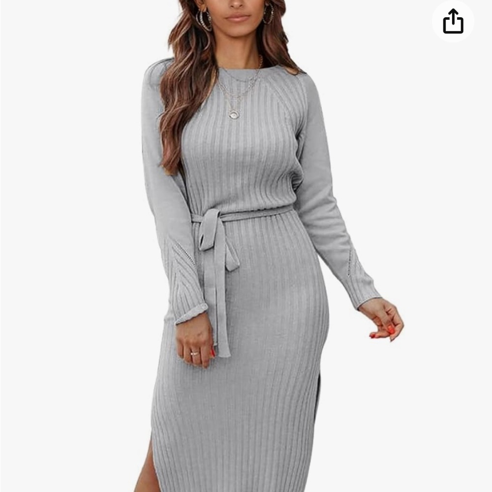 Women’s long sleeve sweater dress slit to side both sides.